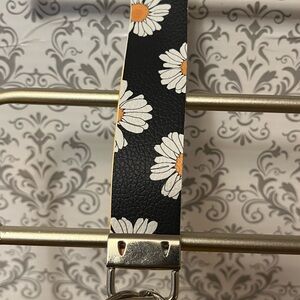 Homemade faux leather daisy wristlet